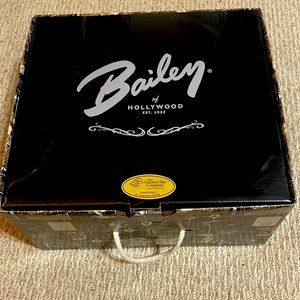 Selling authentic Bailey of Hollywood Hat. Tan with a black stripe, with feather